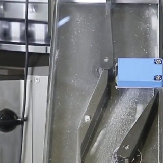 High speed tablet discharge and sampling